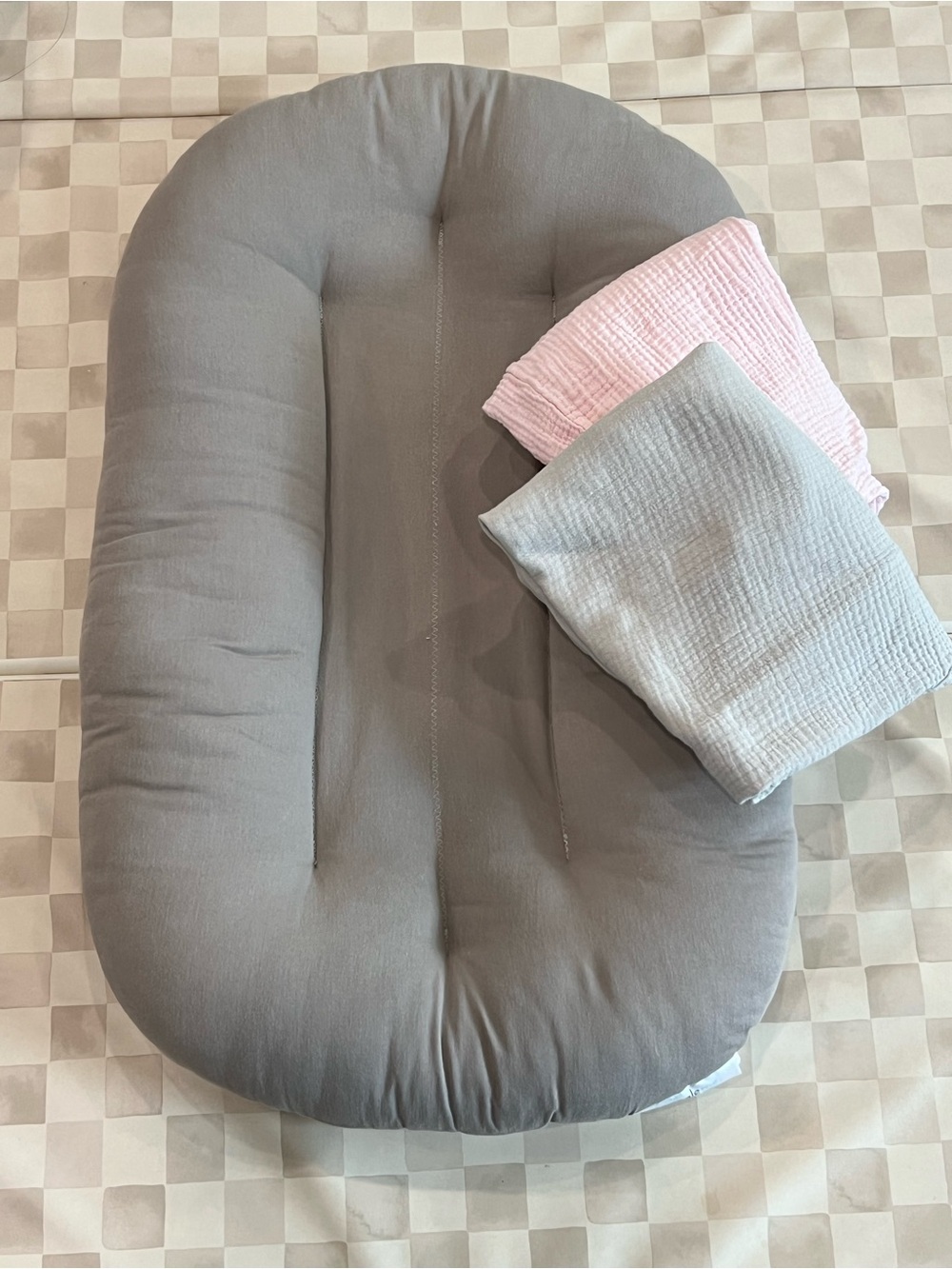 Gray Baby Mattress Cover with Pink and Light Gray Muslin Swaddles